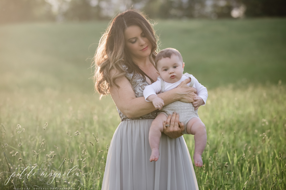pittsburgh-family-photographers-portrait of mom and baby son in field at sunset