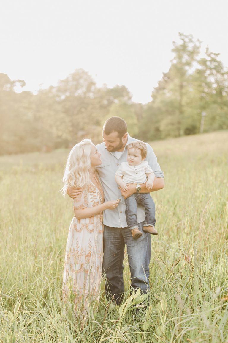 styled one year milestone photo session in tall gras field at mingo creek park
