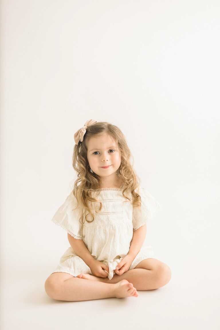 Pittsburgh little girl posing for photo in family photography studio