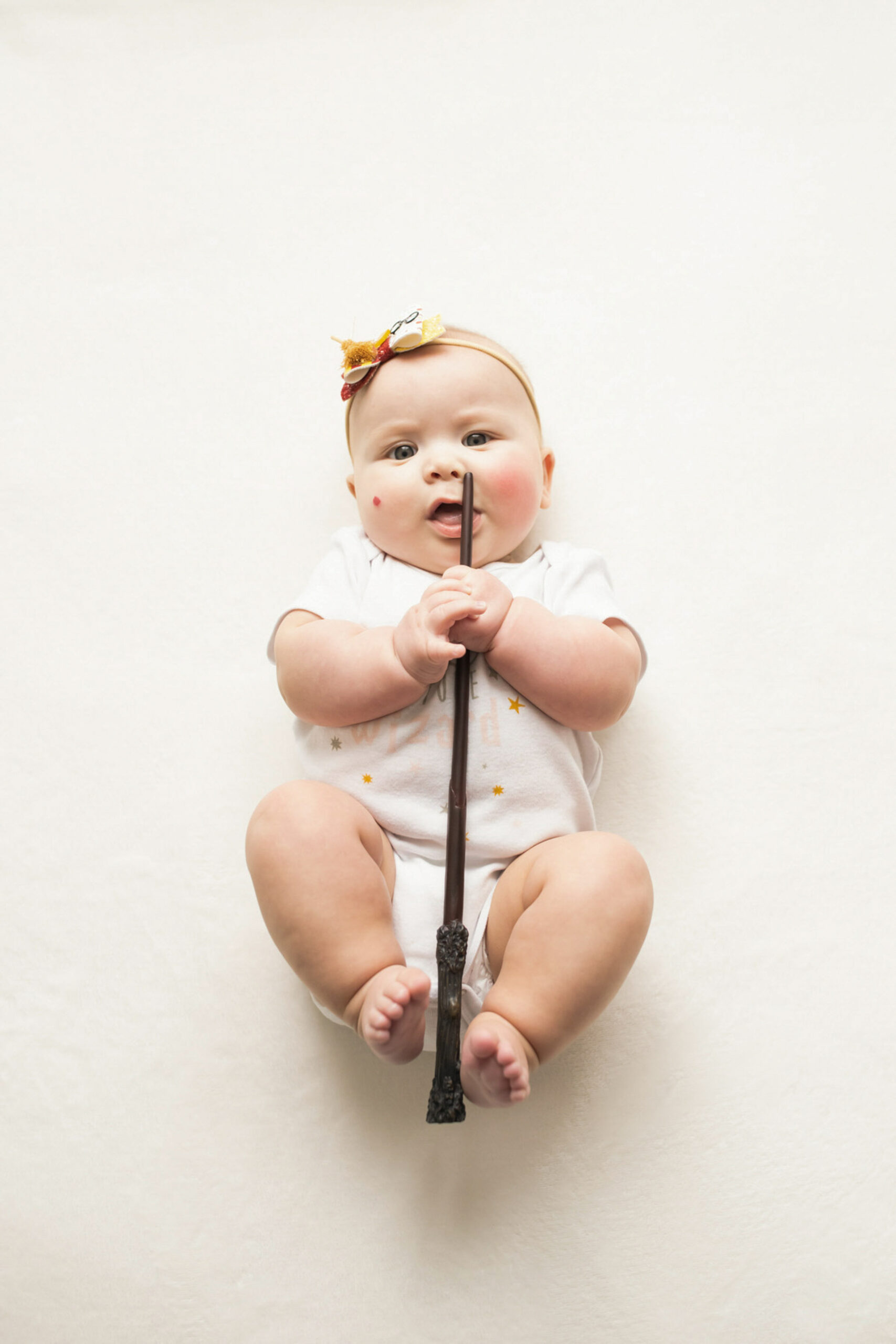 Harry Potter theme six month baby girl during family photos